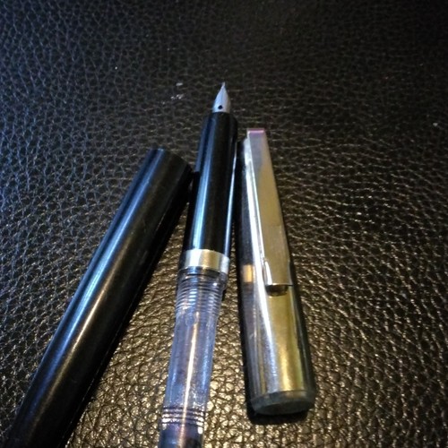 Black plastic fountain - fountain, pen