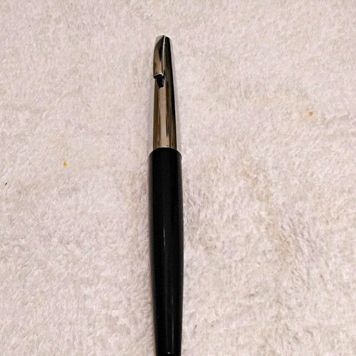 Black plastic fountain - plastic, pens